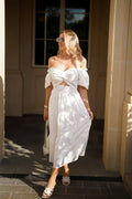 Luxuii Smocked Short Puff Sleeve Twist Knot Cutout Flowy Dresses