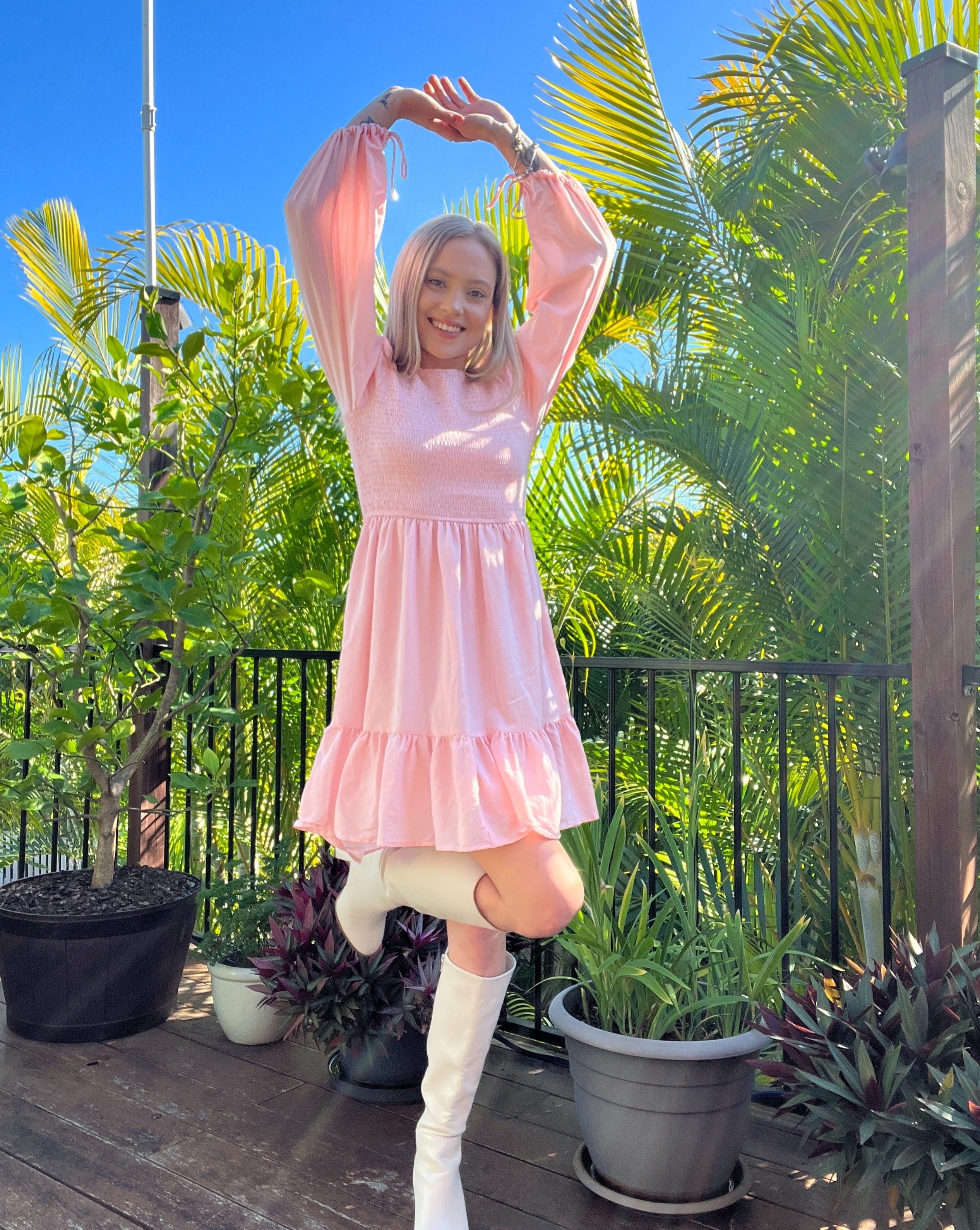 Luxuii Long Sleeve Crew Neck Smocked Tiered Mini Dress